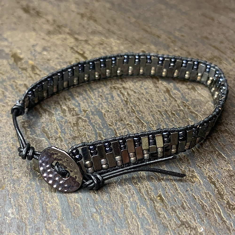 Handwoven sterling silver, hematite and leather bracelet